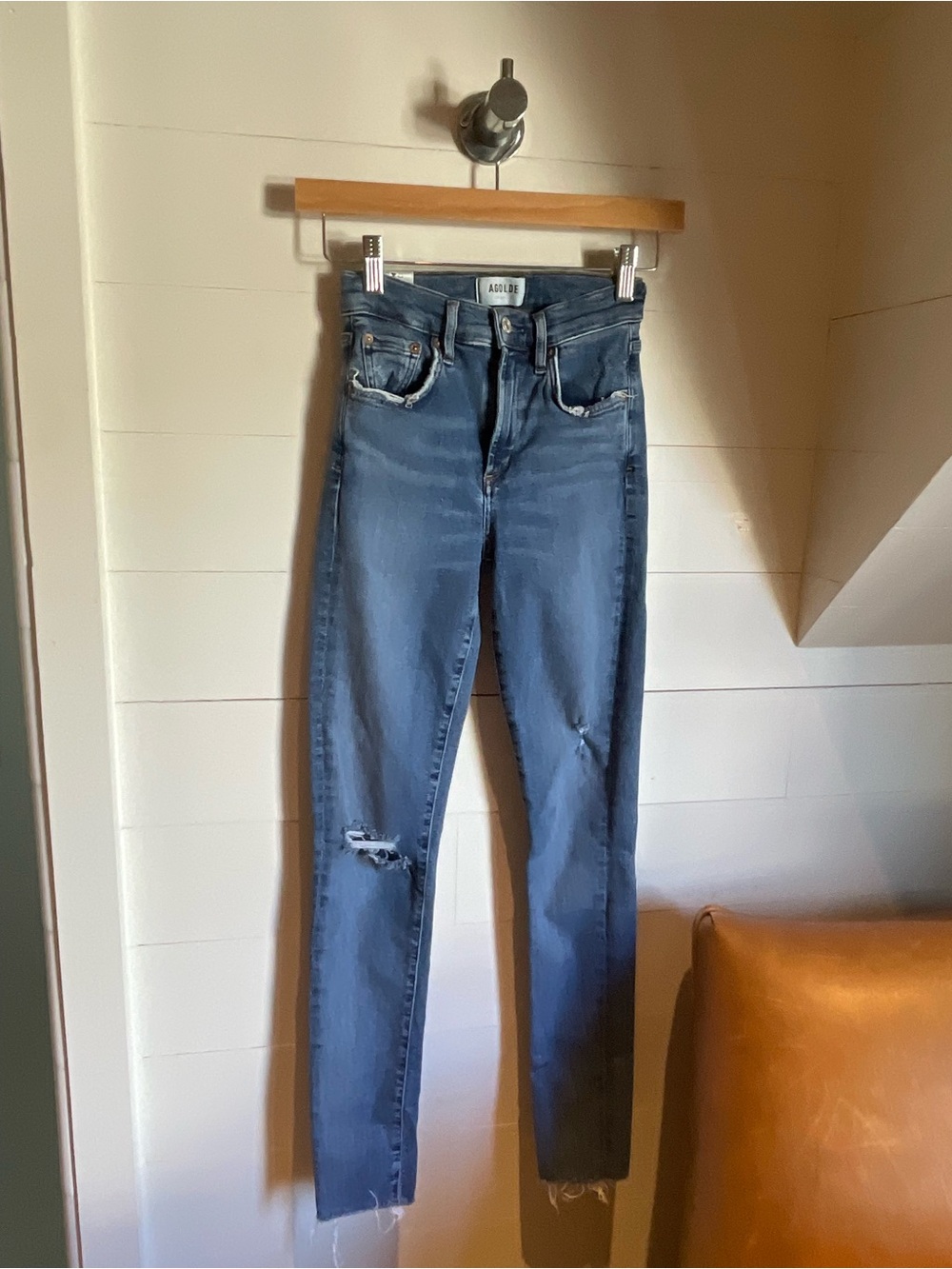Agolde Skinny High-Rise Jeans in Mid Blue Wash with Knee Rip
